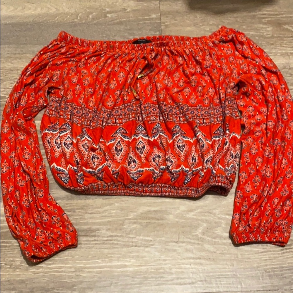 Off the shoulder red shirt